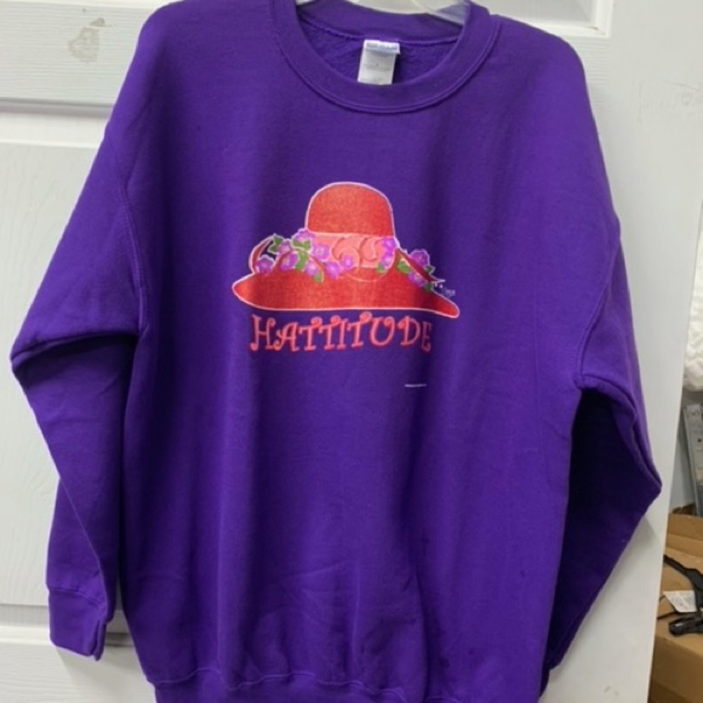 purple sweatshirt red hat Hattitude